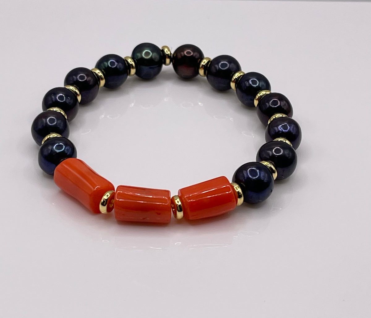 The Nomad Pearl & Coral bracelet